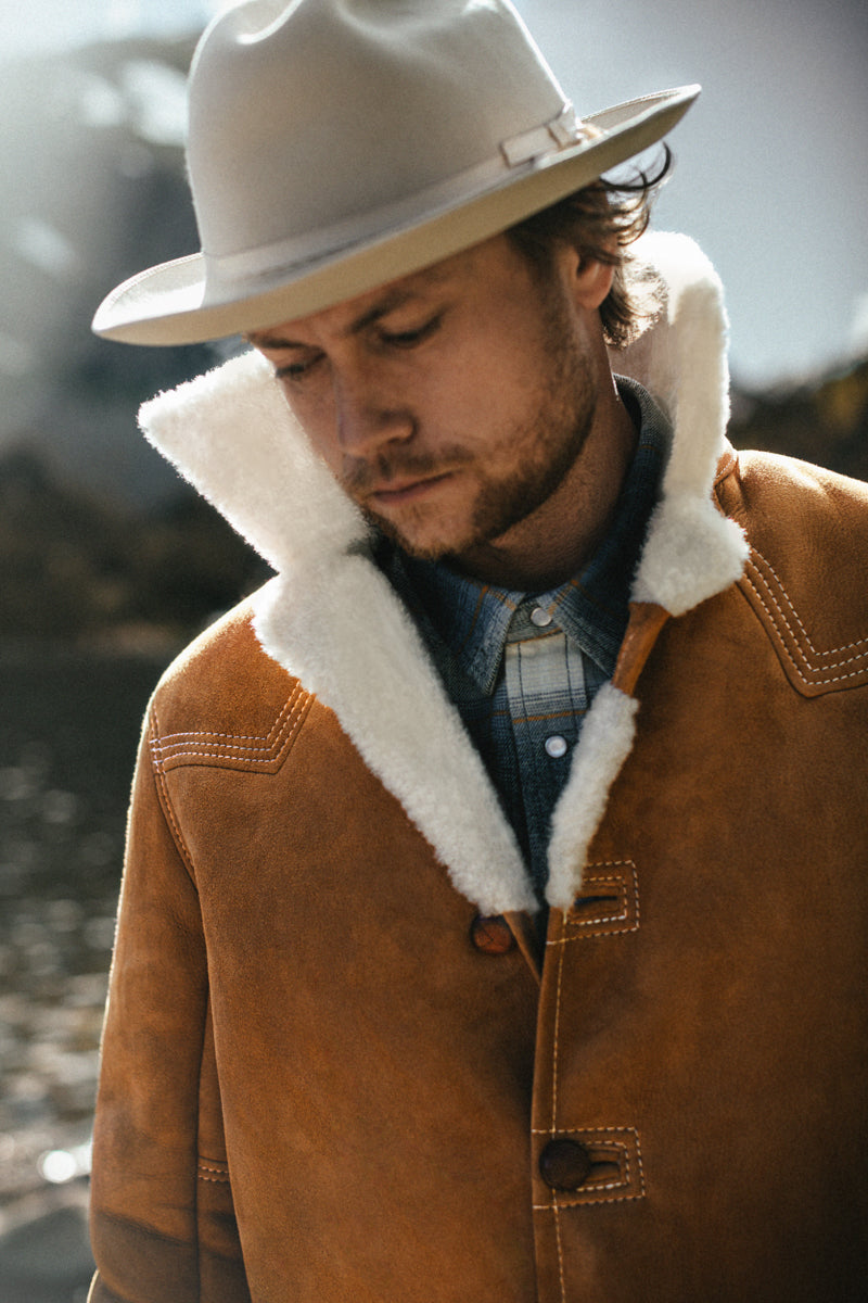 Shearling coat deals